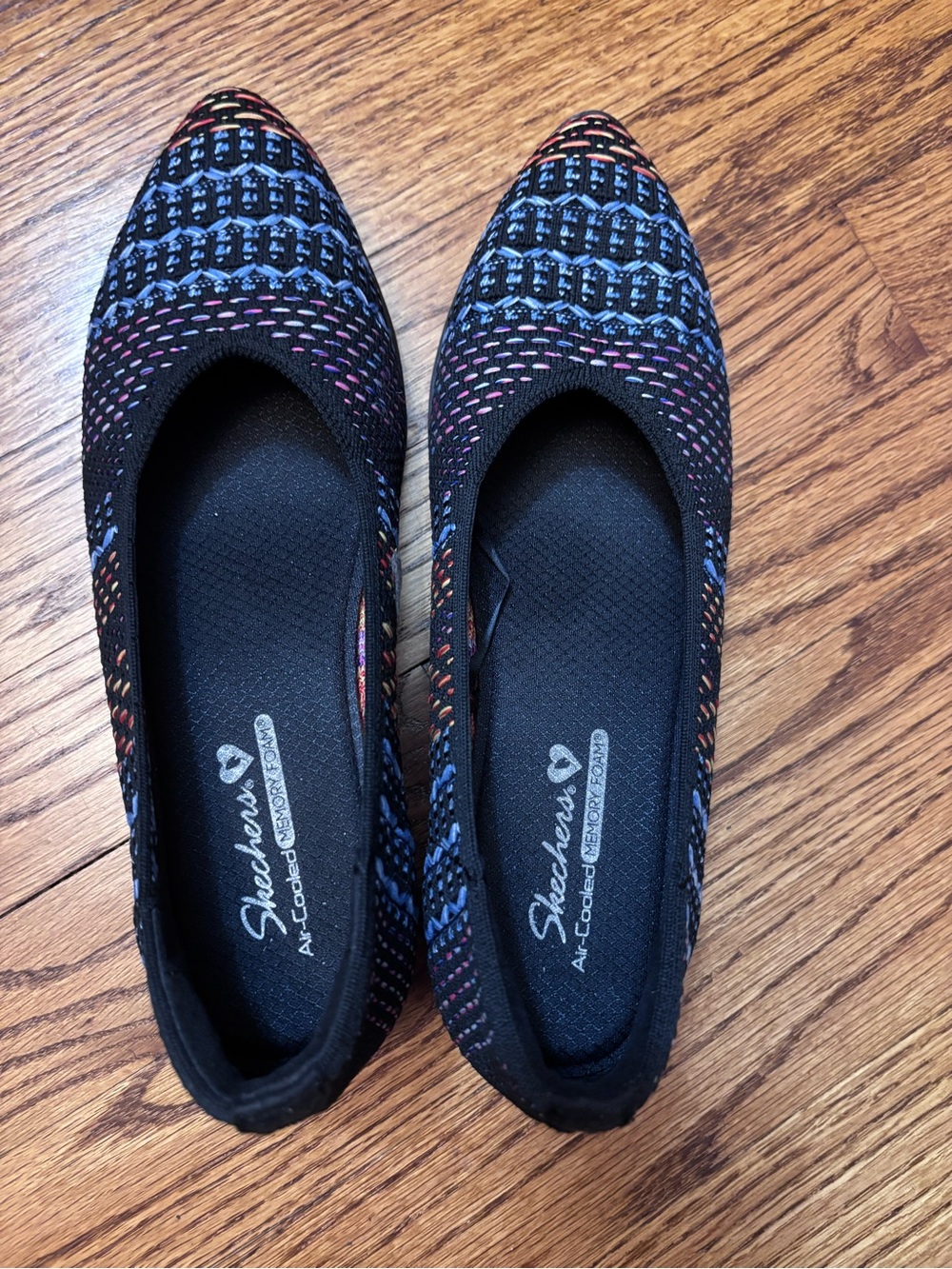 Skechers Women's Black Knit Slip-On Flats with Blue and Pink Accents